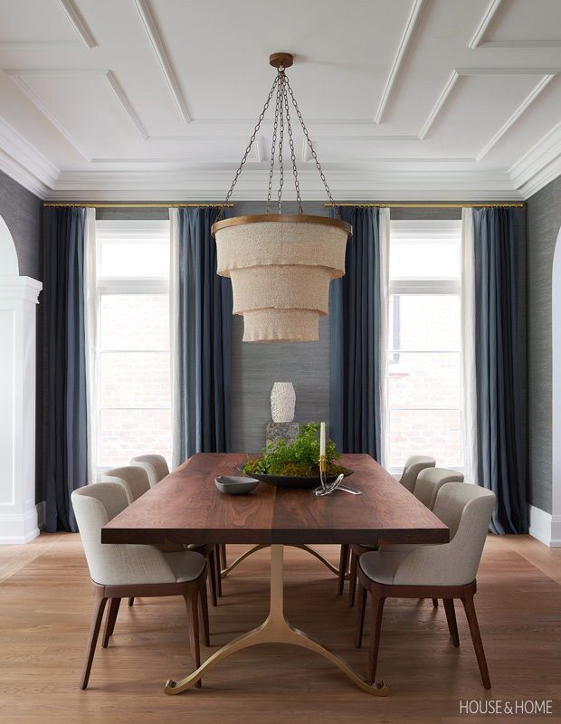 Silvery blue grasscloth wallpaper and ombré drapery make the dining room cozy. | Photographer: Alex Lukey | Designer: Erin Feasby & Cindy Bleeks, Feasby & Bleeks Design