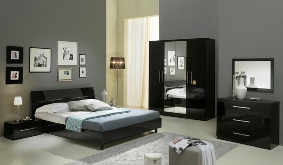 dark gray themed room with black bedroom furniture