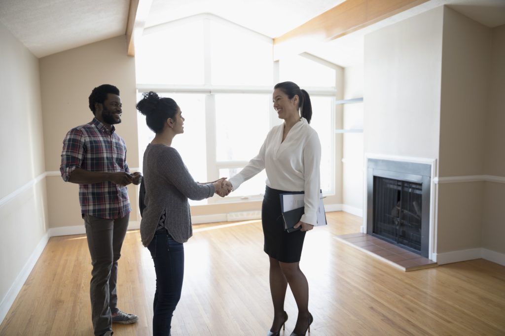 Buyer visiting property with a lady realtor