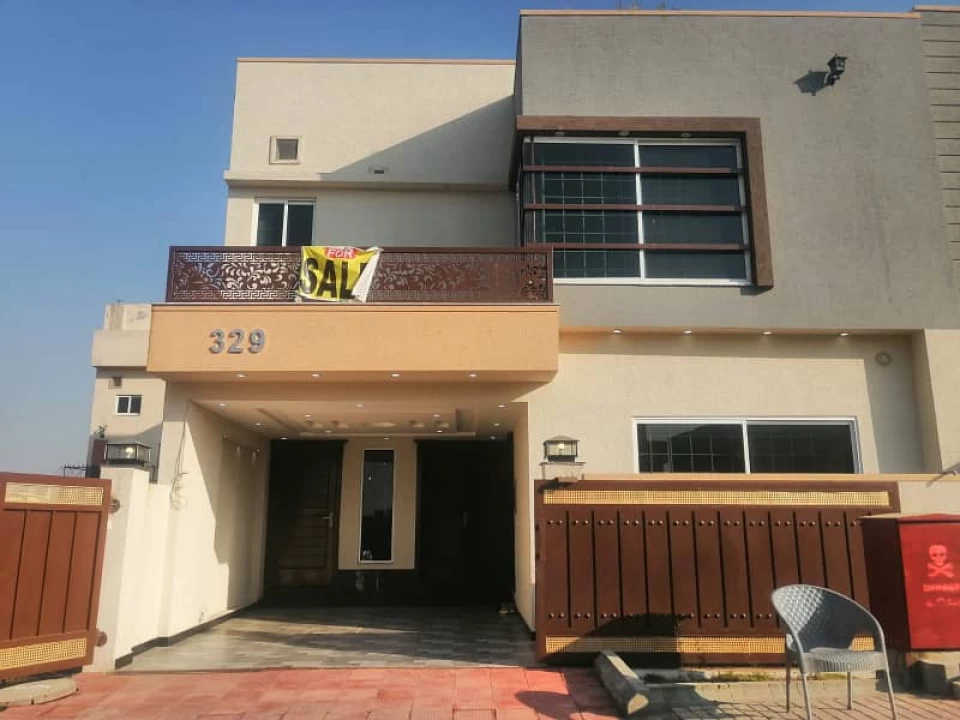 A double unit house for sale in ali block in bahria town phase 8 ra