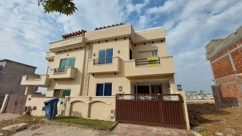 A double unit house for sale in ali block in bahria town phase 8 ra
