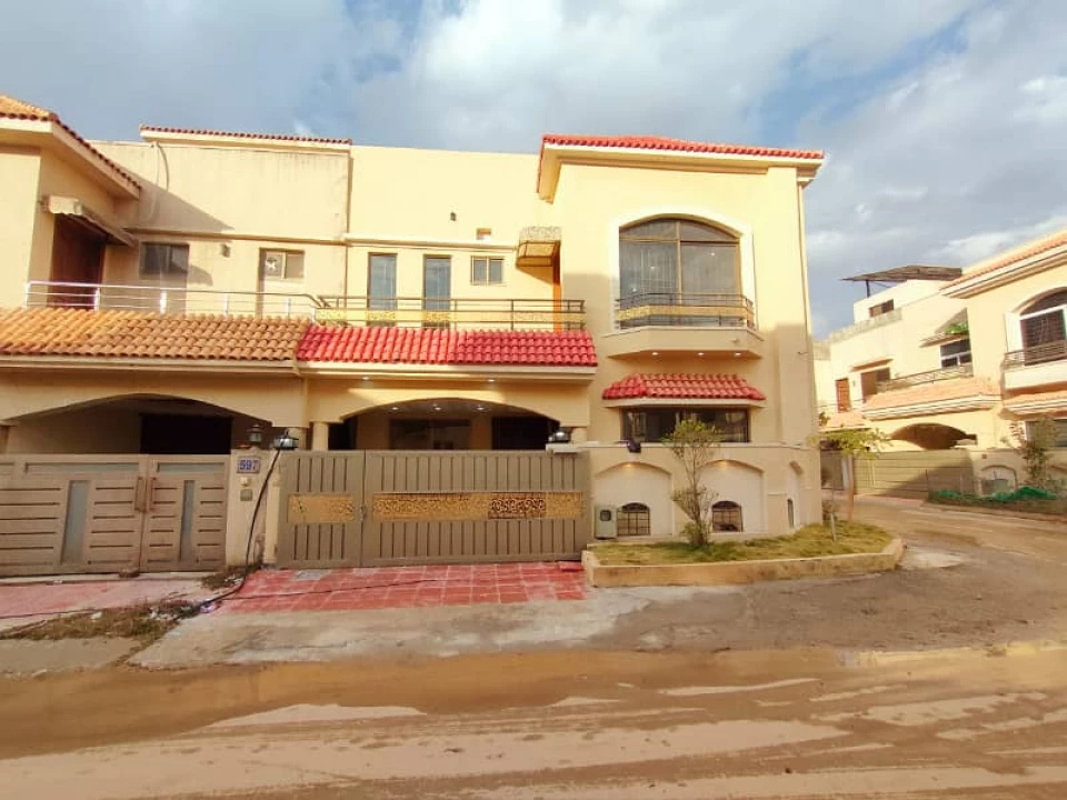 A double unit house for sale in usman block in bahria town phase 8