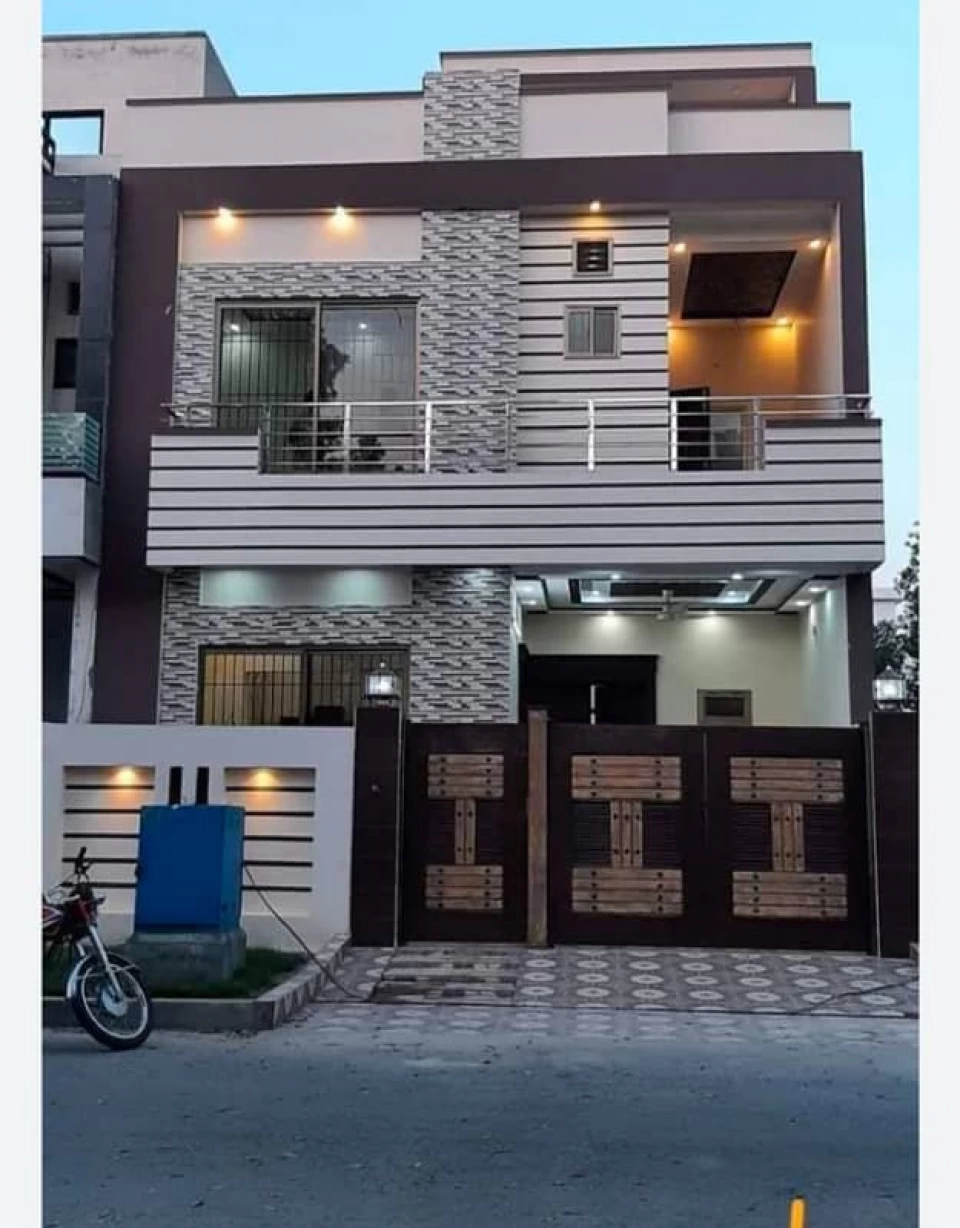 Ghalib city society boundary wall canal road faisalabad vip location 5 marla double story hours for rent