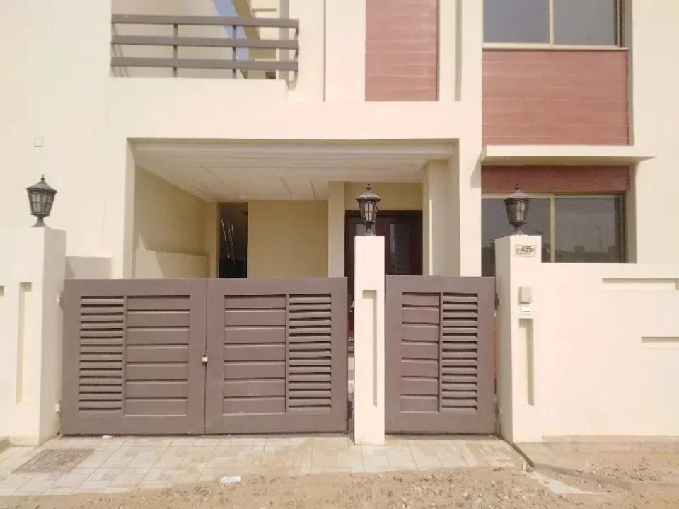Buy a centrally located 6 marla house in dha defence - villa community